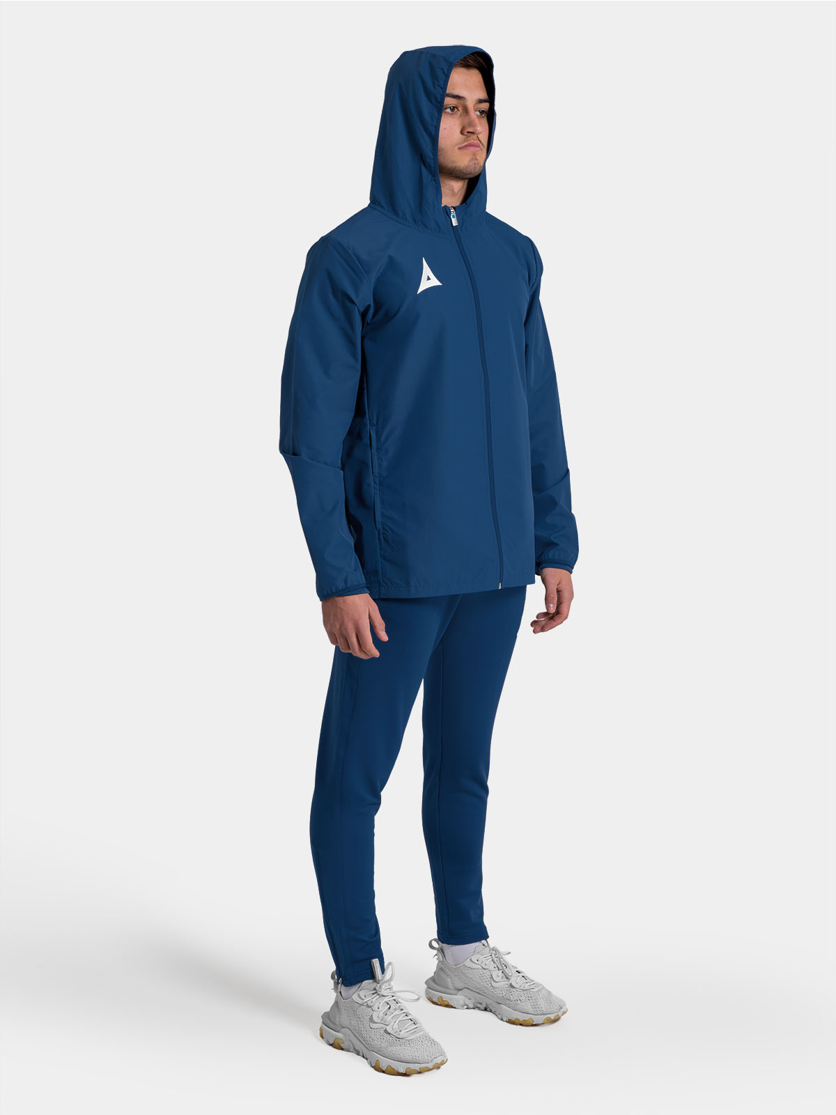 	full-body look of the navy focus 2 shell jacket, a dependable choice for club travel and sideline wear.