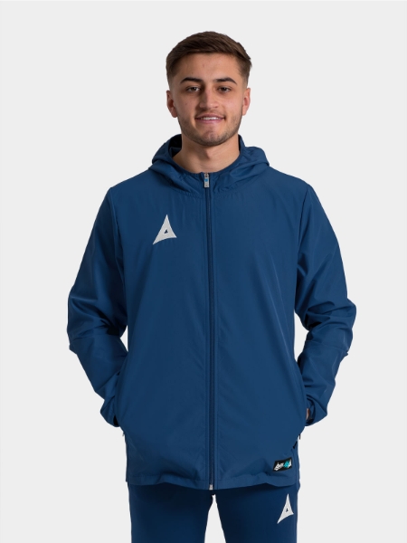 	Adult model wearing the Navy Focus 2 Shell Jacket, showcasing the secure full-zip fastening