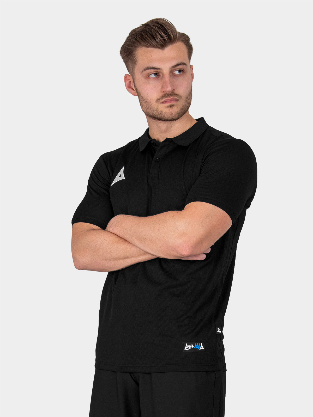 	a male model wearing the avec focus 2 black tech polo, plain black styled button up top