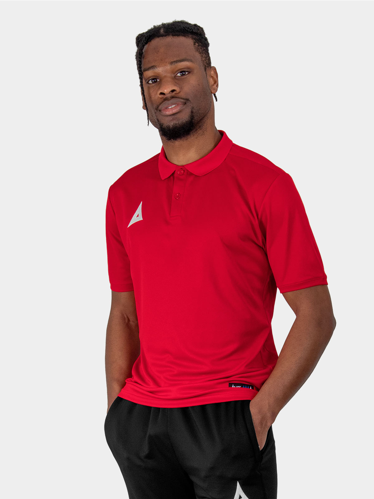 	a male model wearing the avec focus 2 red tech polo, plain red top