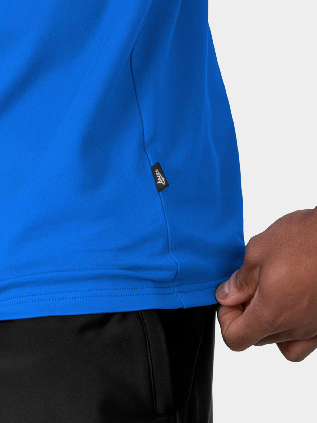 close-up of authentic sportswear id label on the avec evolve royal blue t-shirt
