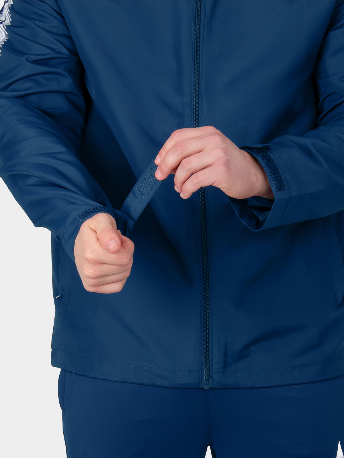 	navy evolve rain jacket open showing breathable mesh lining and full length zip fastening