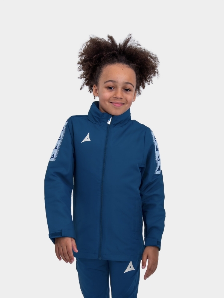 	Junior player in navy Evolve Rain Jacket - grassroots football rain jacket junior sizes from £25.75