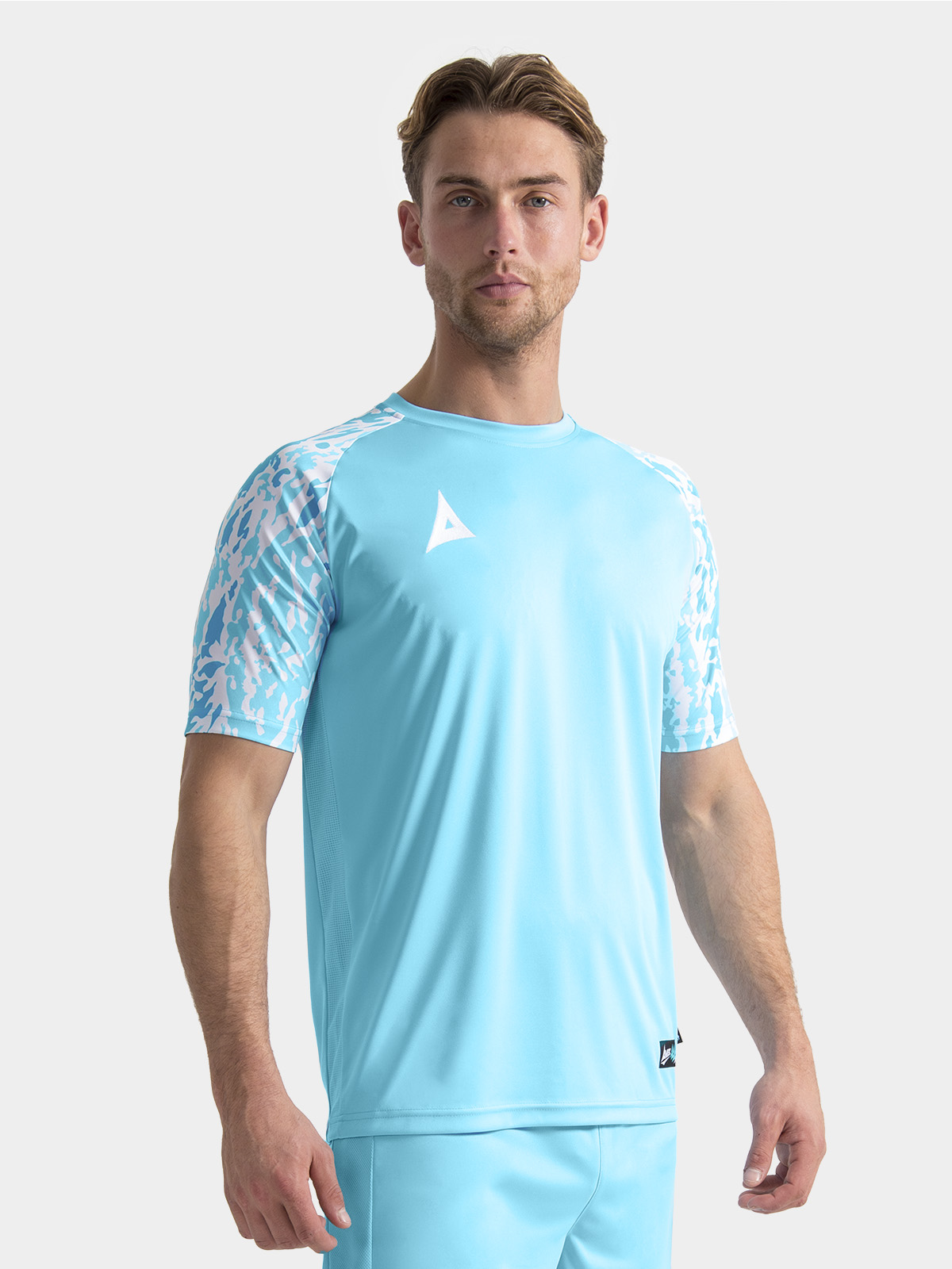	lifestyle shot of a model wearing the hyper sky classic pro jersey, illustrating the modern athletic silhouette.
