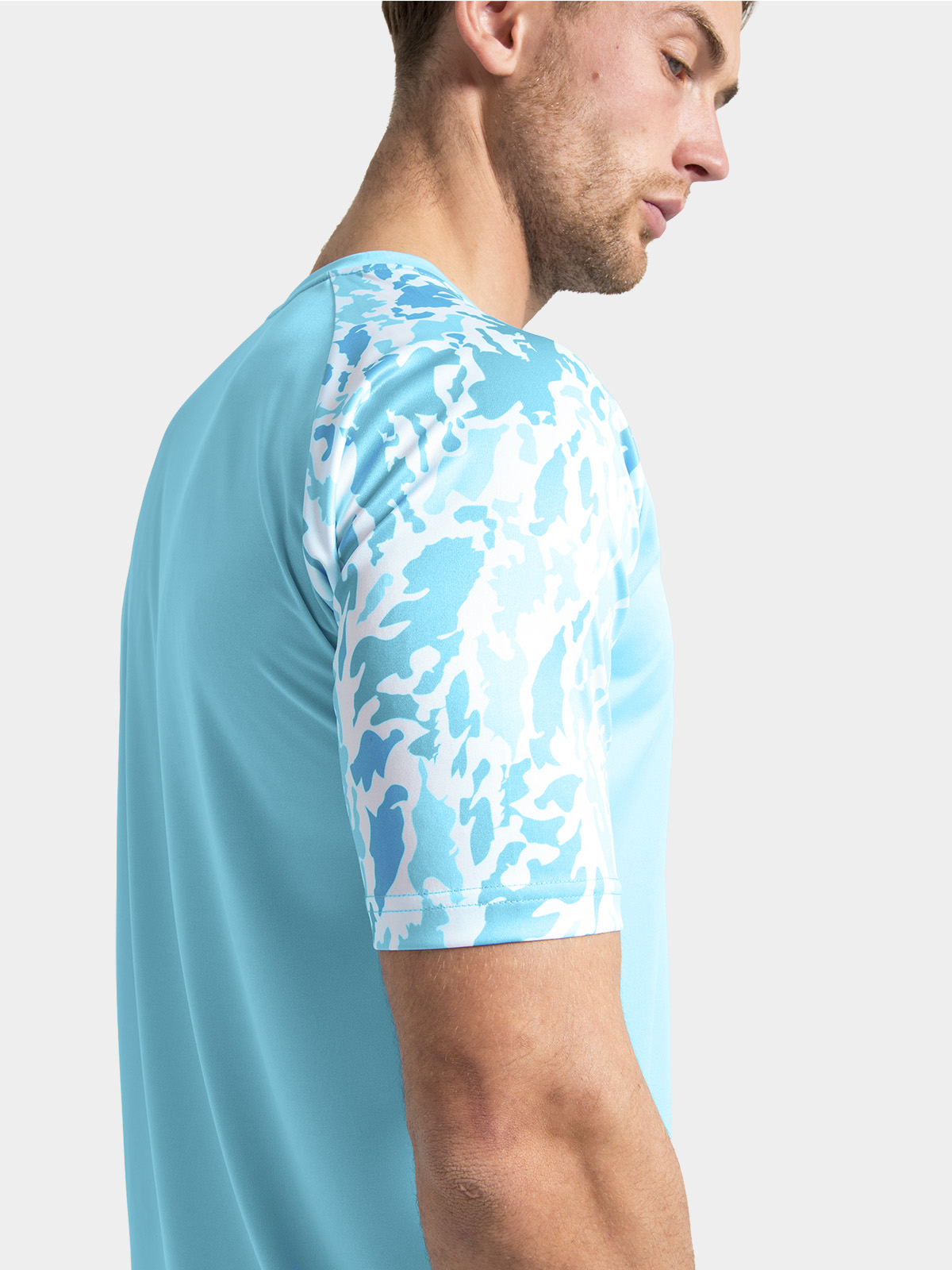 	close-up of the intricate sky blue sublimated camo pattern, providing a technical finish to the sleeves.