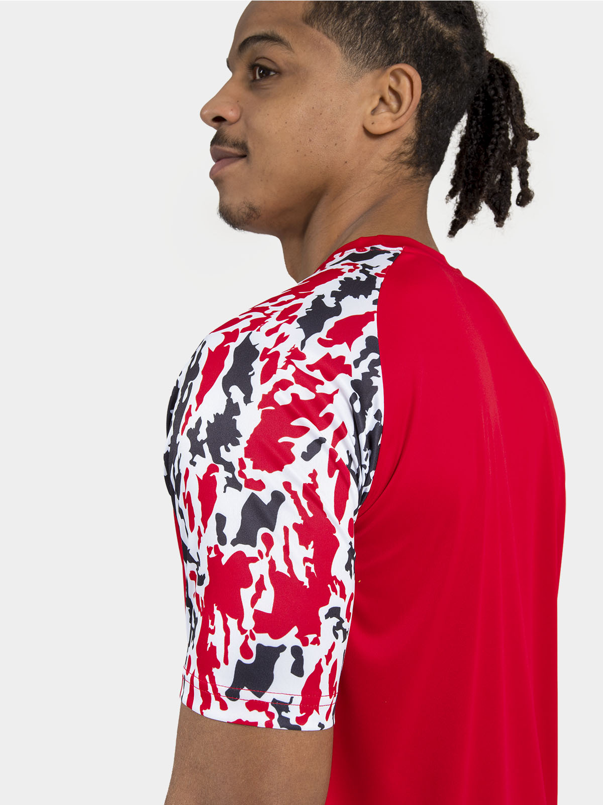 	close-up view of the red camo sublimation, highlighting the unique disruptive design of the classic pro range.