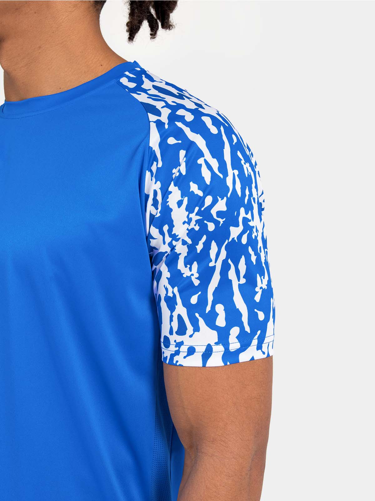 	detailed perspective of the royal blue sublimated camo pattern, providing a high-end finish to the sleeves.