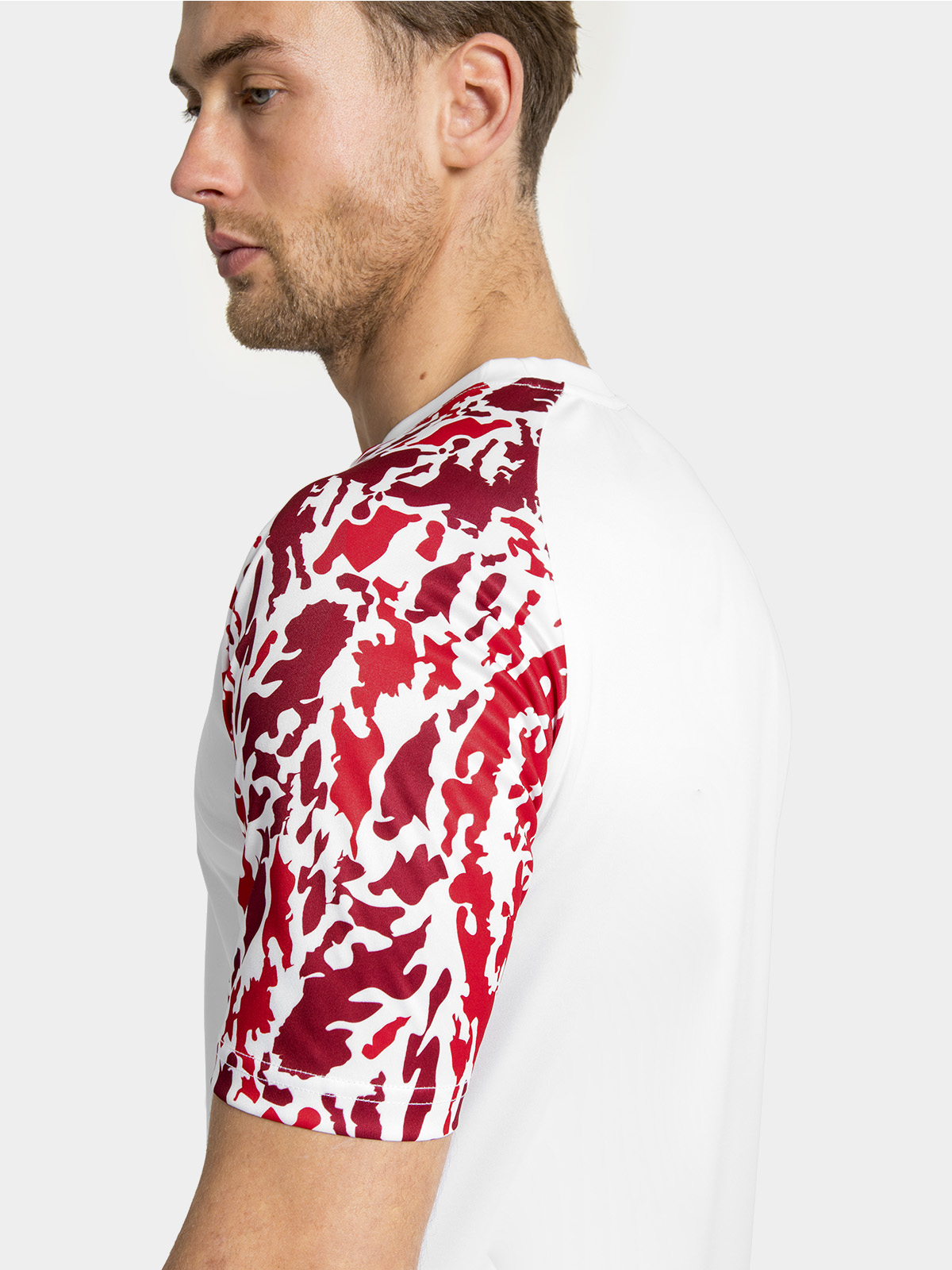 	view of the intricate red sublimated camo design on the sleeves of the classic pro jersey.
