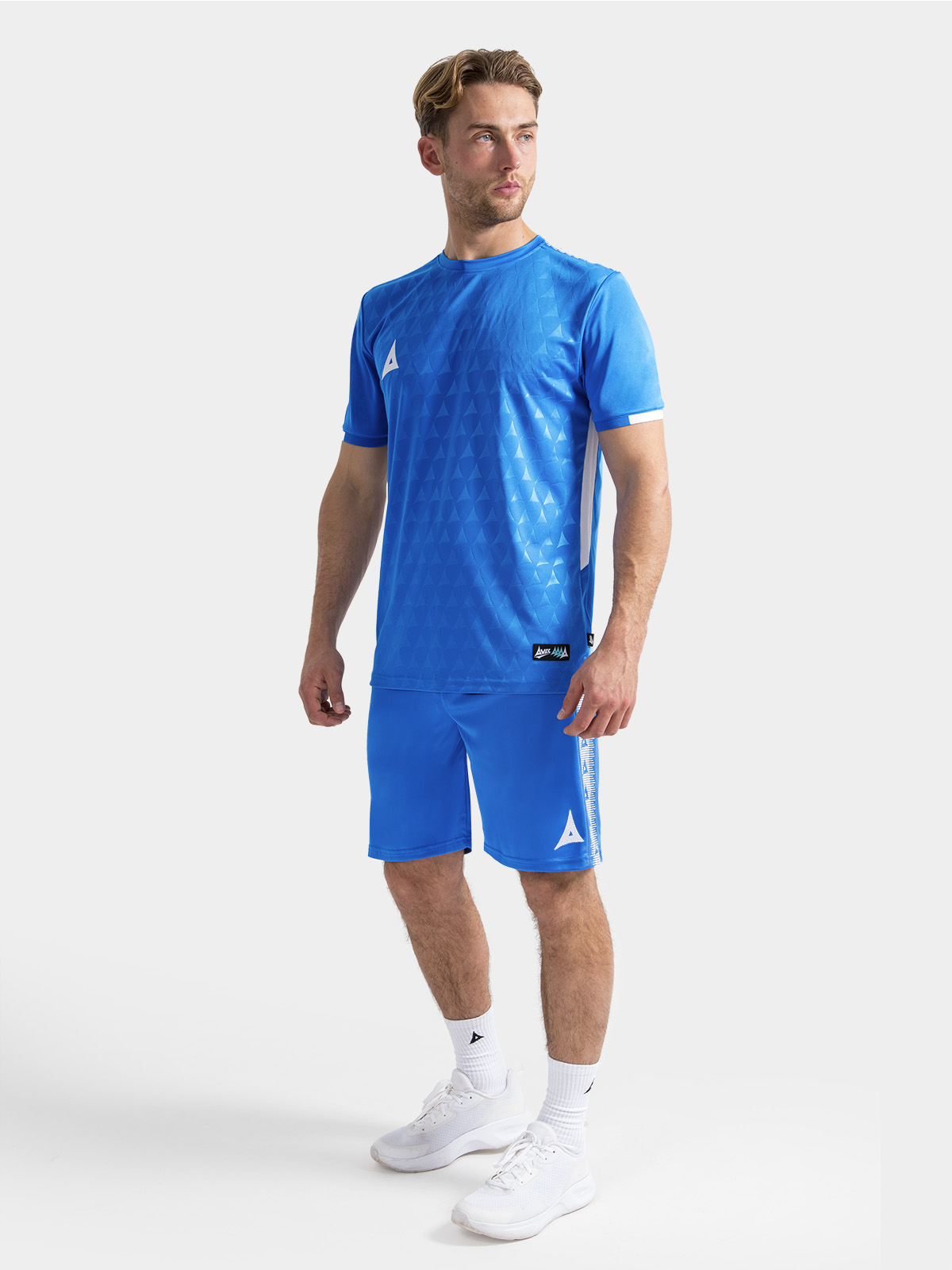 	full matchday preparation kit view in royal blue, featuring the evolve pro jersey and shorts.