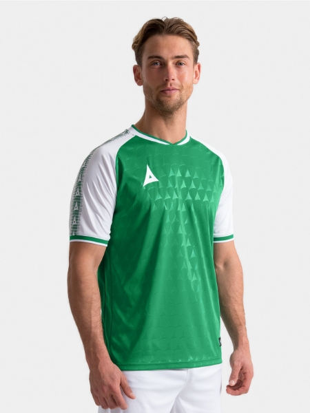 	Lifestyle shot of the Green and White Heritage Jersey showing the premium debossed fabric on-model.