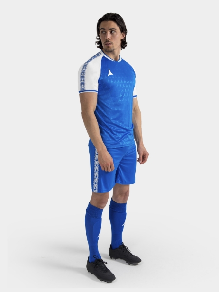 	Complete Royal Blue Heritage match kit on-model, showcasing the full professional aesthetic.
