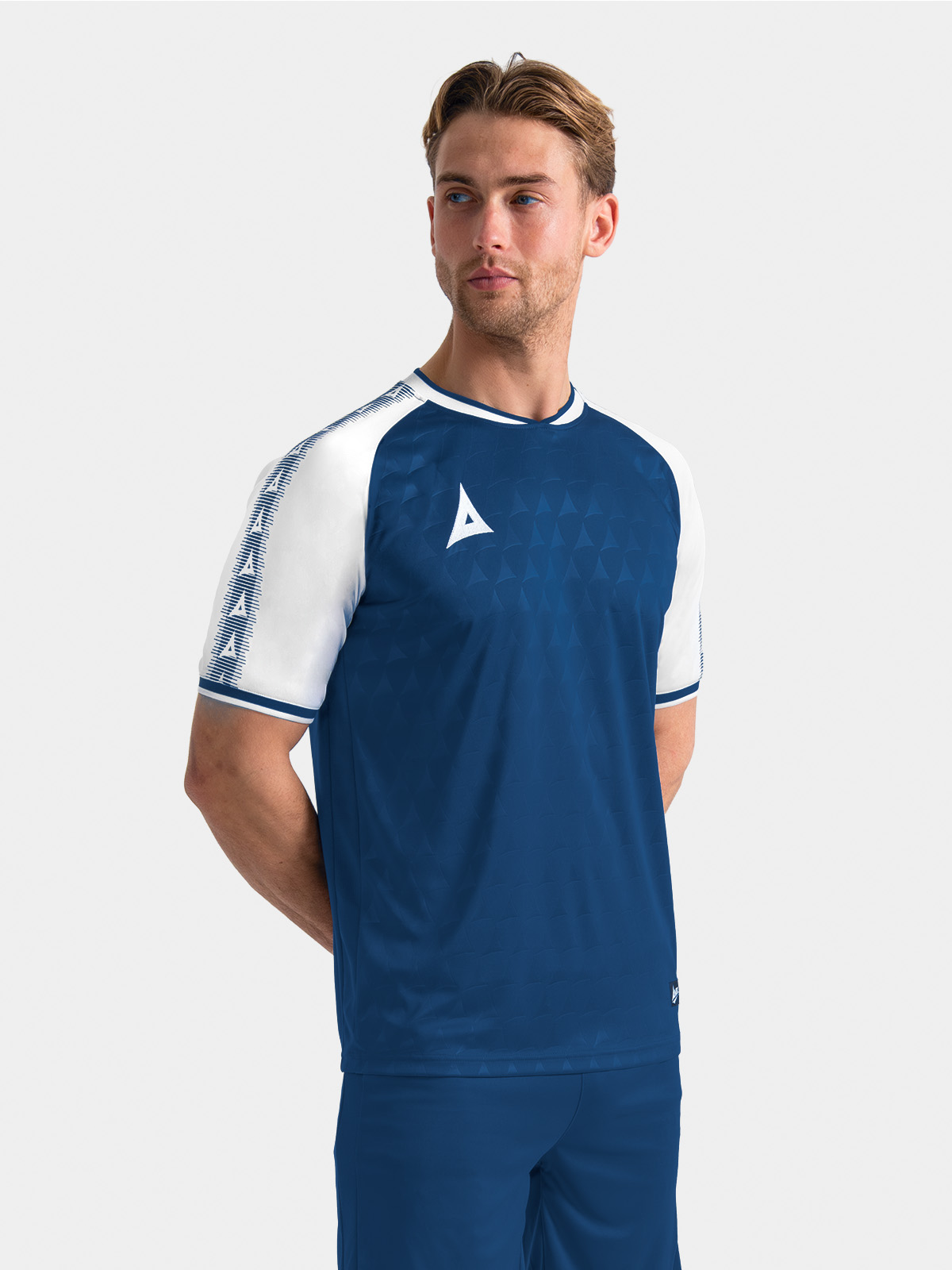 	lifestyle view of the navy and white heritage jersey, focusing on the comfort-fit chest and shoulders