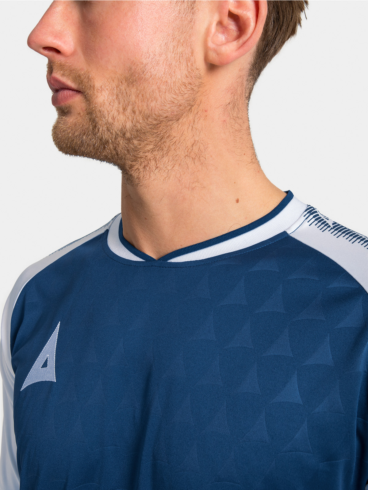 	interior view of the navy and white heritage neckline showing the premium internal branding.