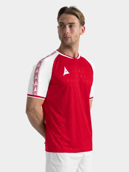 	Top-half lifestyle view of the Red and White Heritage Jersey for a professional matchday look.