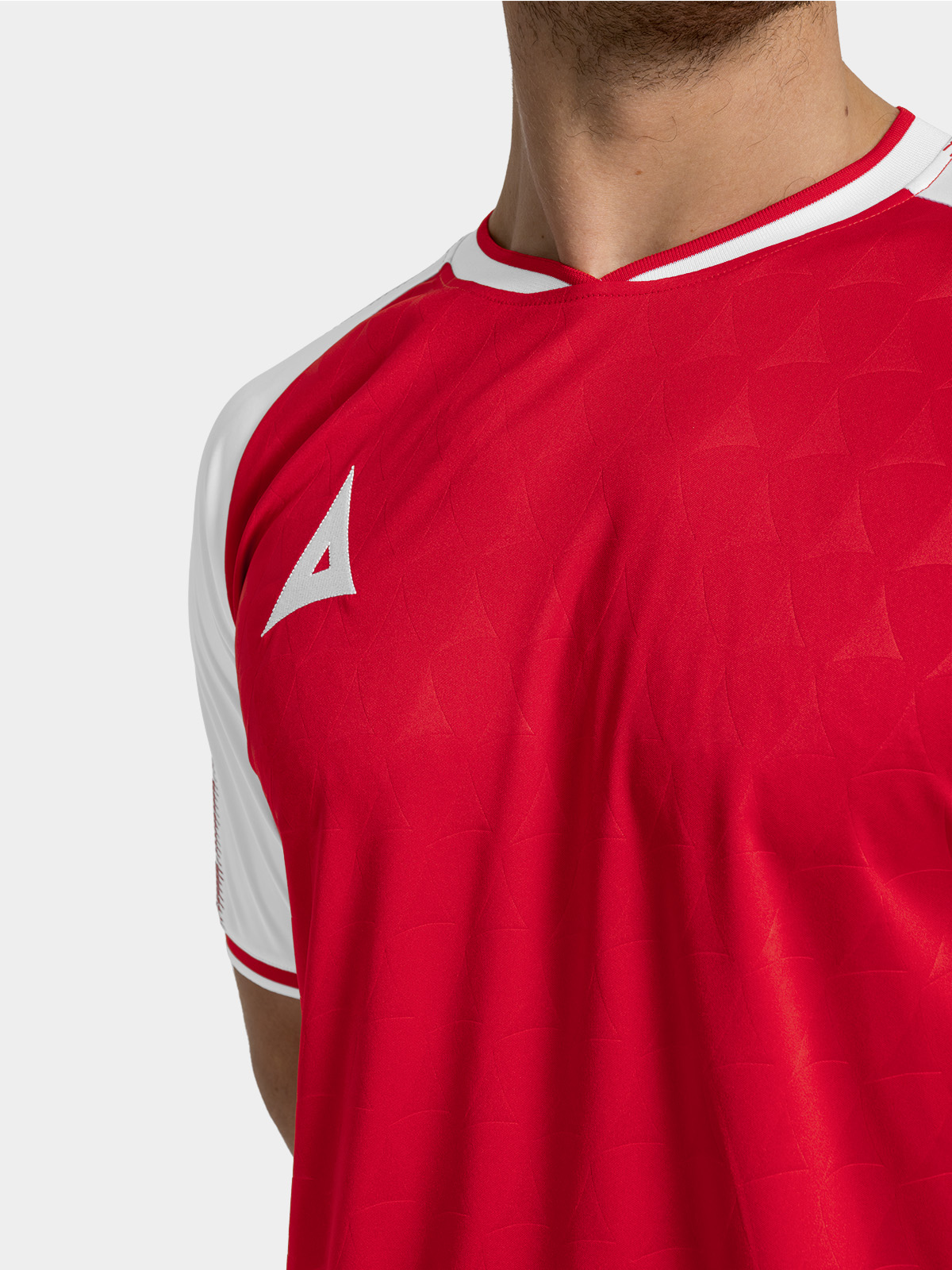 	technical shot of the red heritage jersey neckline and comfort-fit collar.