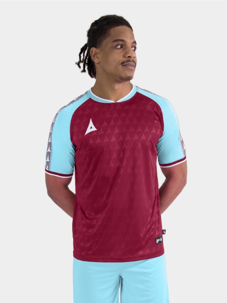 	Model view of the Claret and Sky Heritage Jersey, showcasing the iconic contrast sleeve design.