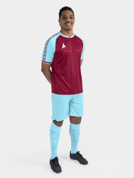 	Full kit model shot of the Claret and Sky Heritage matchday uniform
