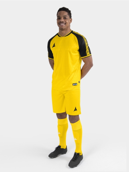 	Full body view of the Yellow and Black Heritage matchday kit with matching shorts and socks.