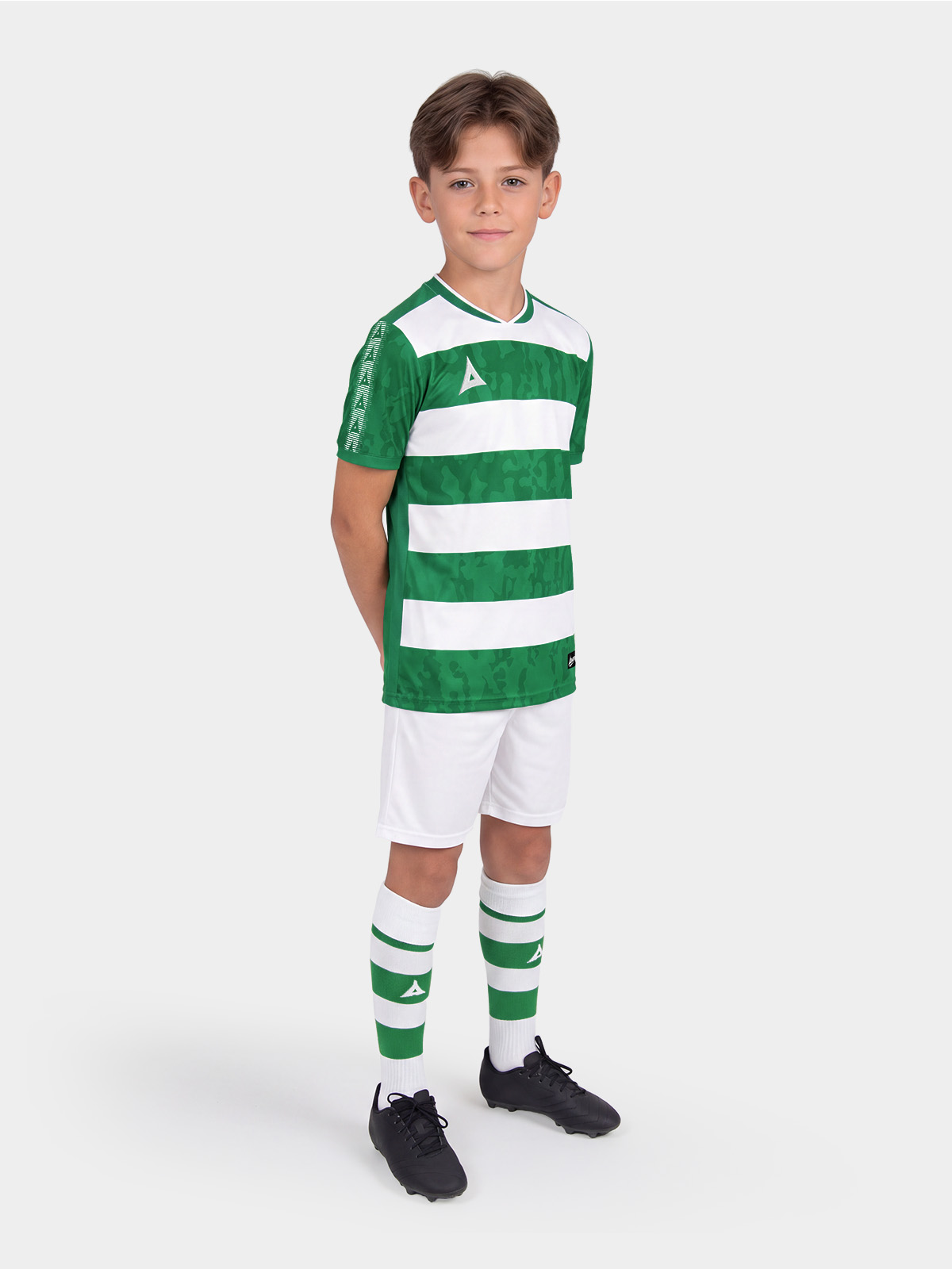 	full kit look featuring the green and white pro intent hoop jersey on-model for a professional club aesthetic.